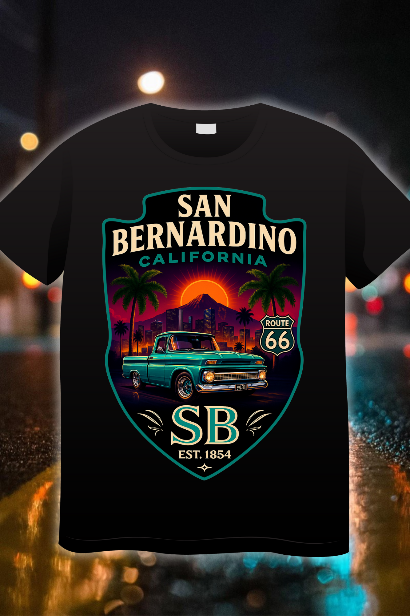 “San Bernardino Route 66 Edition t-shirt featuring a classic green truck, palm trees, and sunset badge design”
