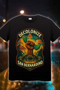 Decolonize San Bernardino Legacy Edition t-shirt with raised fist, cactus, and Indigenous-inspired badge artwork